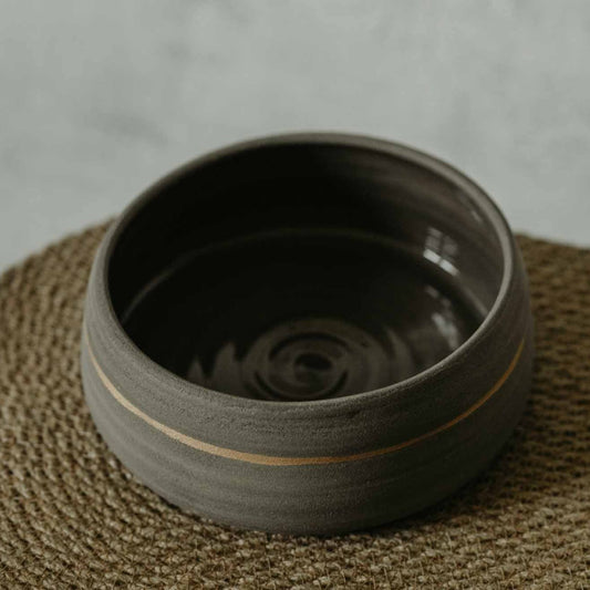 Grey and gold dog bowl