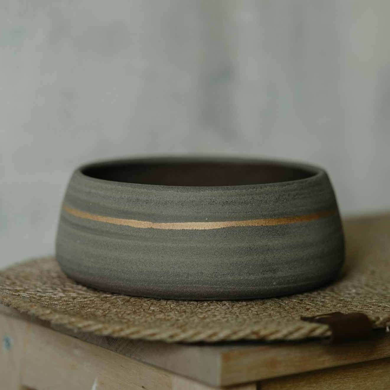 Grey and gold dog bowl