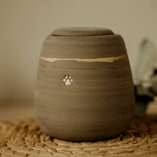 Handcrafted ceramic dog urn with gold paw print - personalized with pet's name - size Large (1000 ml).