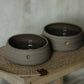 Handcrafted ceramic dog bowl set - includes 2 bowls and jute mat - stylish and functional.