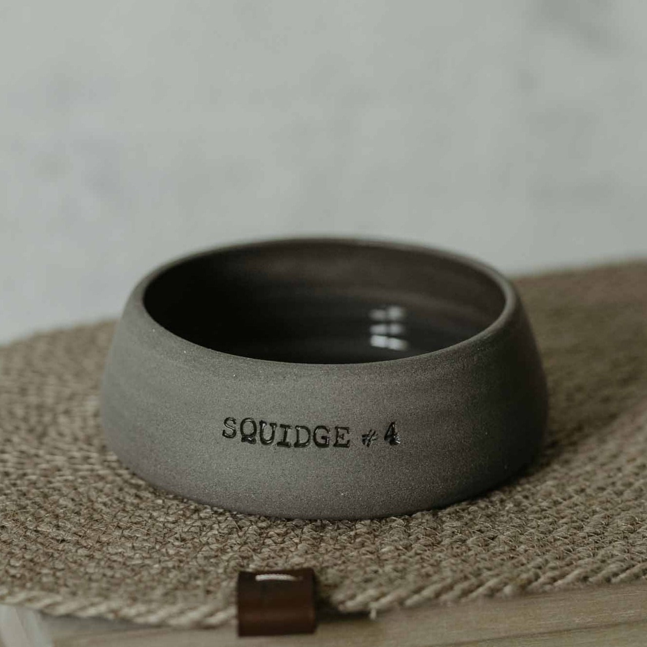 Grey stoneware pet bowl with name